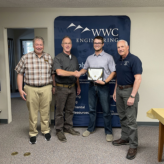 William Mumme, a UW senior from Riverton majoring in civil engineering, holds his WWC Engineering Paul Rechard Memorial Scholarship certificate