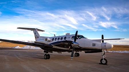 The UW King Air Research Aircraft is pictured on a blue sky day at the Laramie airport.