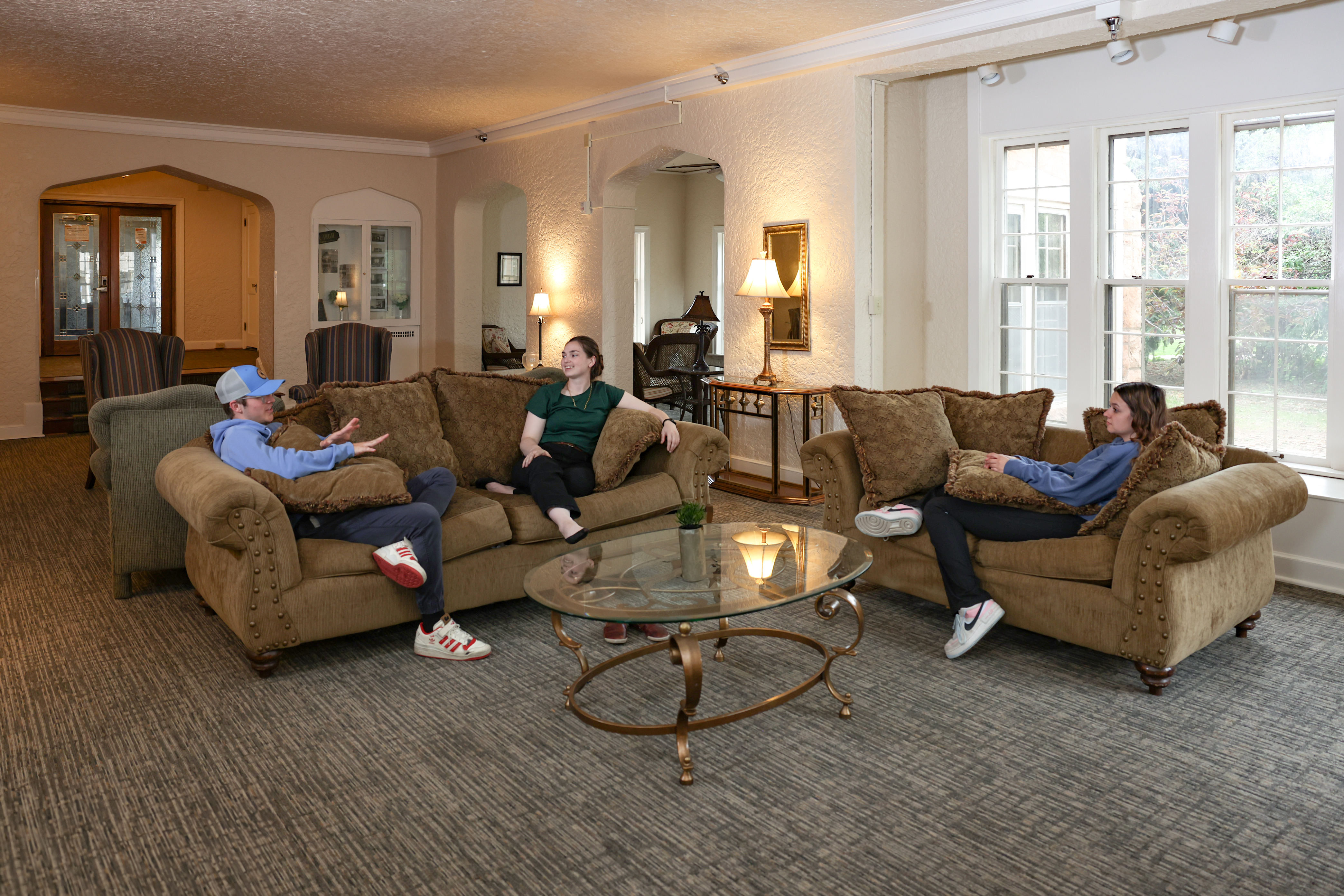 Group visiting in the living area in Tobin House
