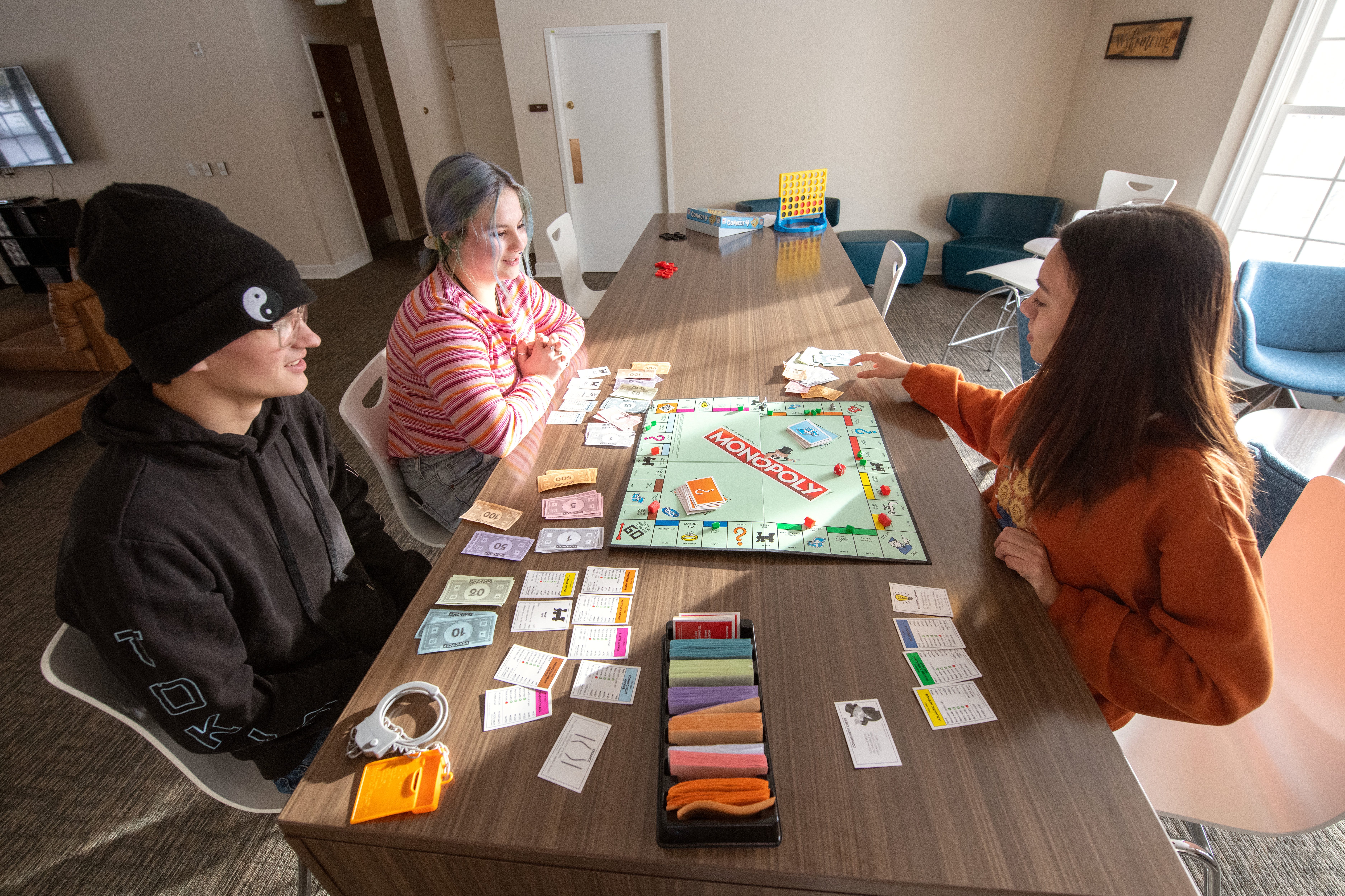 students playing monopoly at tobin house