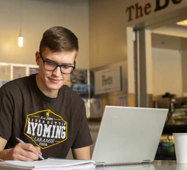 student studying in the Coe Library Book and Bean coffee shop