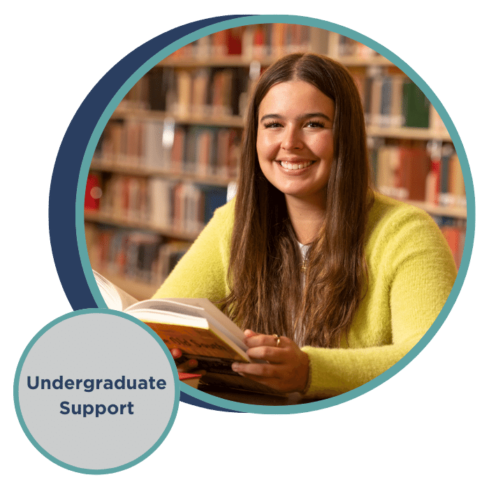 student reading in Coe Library and text that reads "Undergraduate Support"