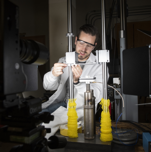 masters degree student, jason young conducts research in a laboratory